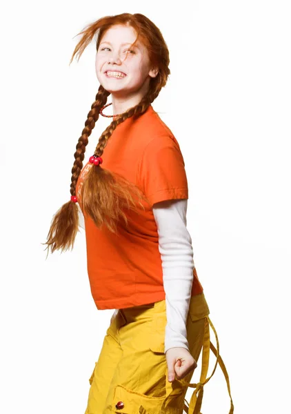 Bild av härlig rödhårig flicka med långa flätor — Stockfoto