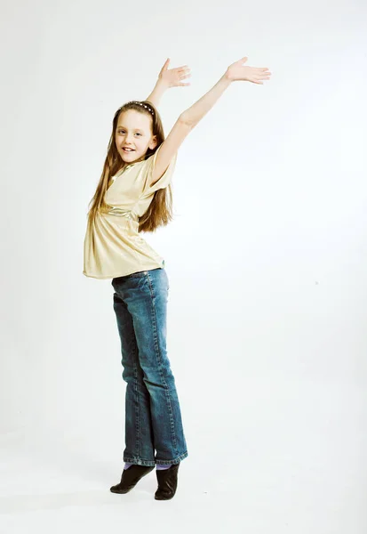 Menina salta em um fundo branco — Fotografia de Stock