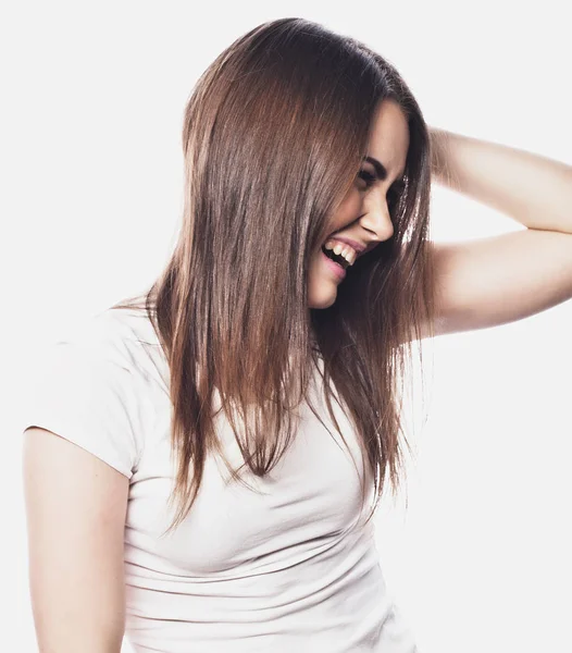 Jovem sorrindo menina loira no fundo branco — Fotografia de Stock