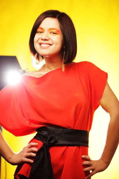 Beautiful woman wearing a red dress — Stock Photo, Image