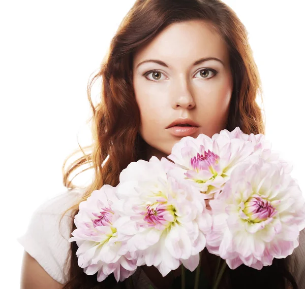 Mulher com grandes flores rosa — Fotografia de Stock