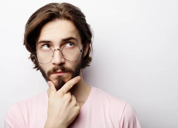 Headshot of satisfied cheerful man wearing glasses, glad to find suitable well paid job, People, emotions and facial expressions concept — Stock Photo, Image