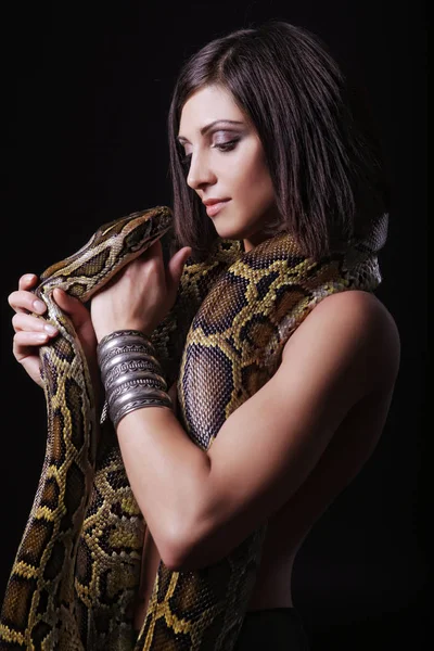 Beautiful woman with a snake — Stock Photo, Image