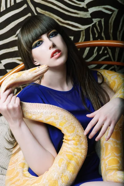 Woman holding yellow Python — Stock Photo, Image