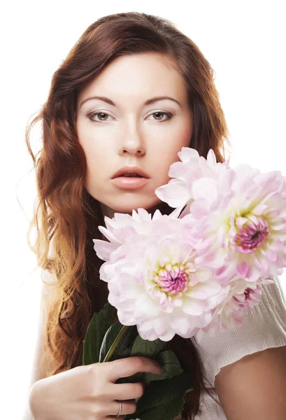 Mulher com grandes flores rosa — Fotografia de Stock