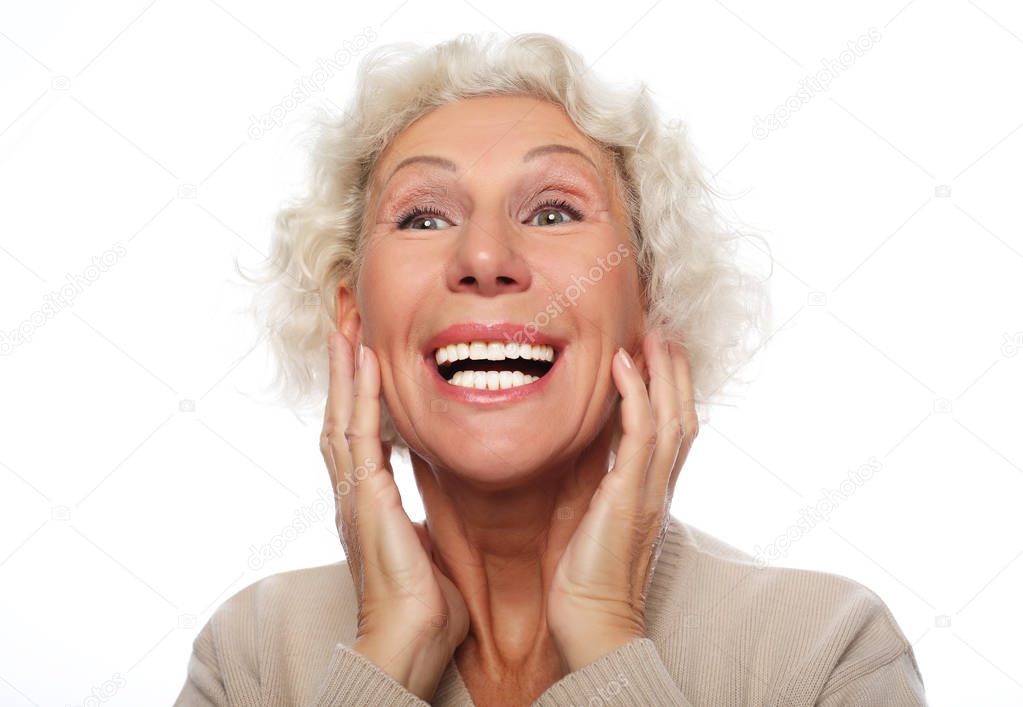 lifestyle, emotion and people concept: Grey haired old nice beautiful laughing woman. Isolated over vwhite background.