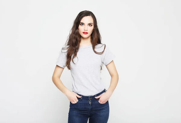 Beautiful woman wearing casual clothes, posing on white background — Stock Photo, Image
