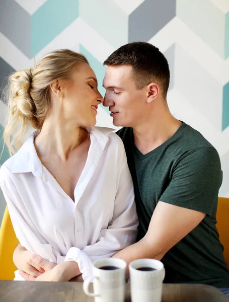 Young beautiful couple having breakfast table — Stock Photo, Image