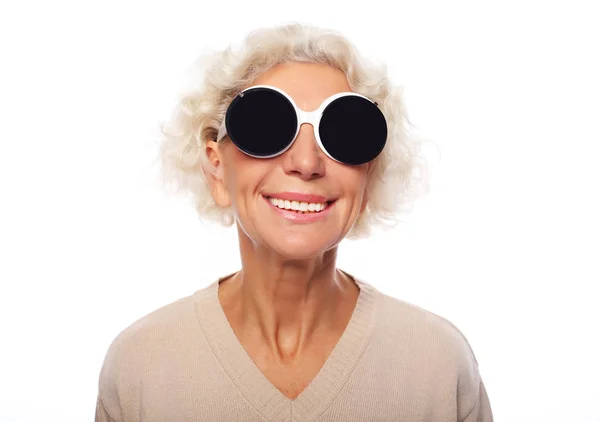 Senior woman wearing big sunglasses — Stock Photo, Image