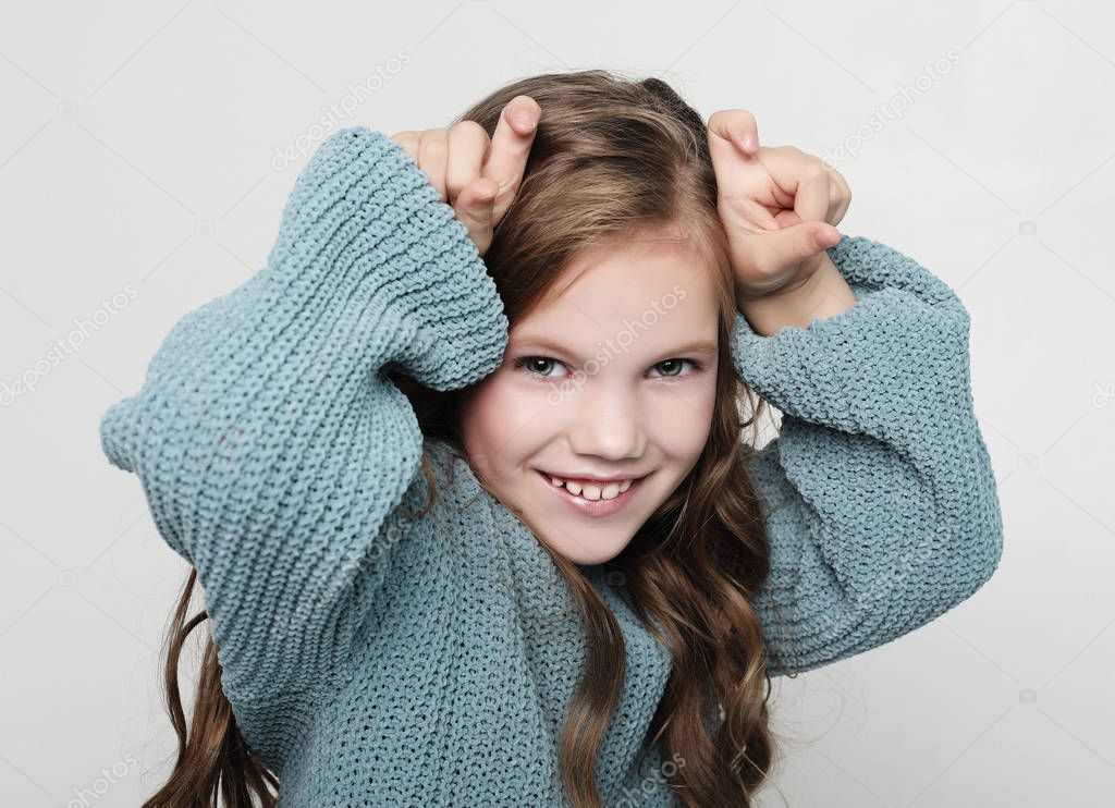   cute girl plays with friends. Portrait of positive happy child