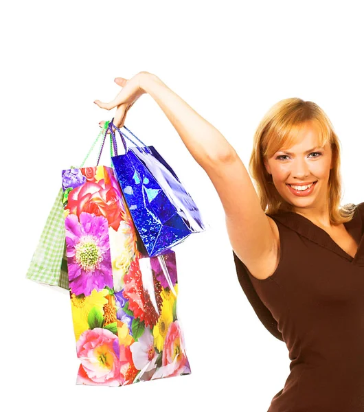 Счастливая девушка с сумками для покупок — стоковое фото
