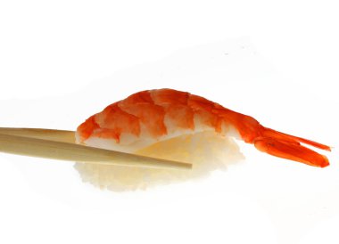 suşi yemek çubukları ile üzerine beyaz vurdu