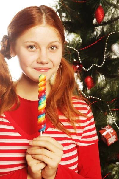 Donna con lolipop e albero — Foto Stock