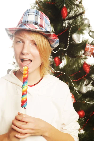 Woman with lolipop and tree — Stock Photo, Image