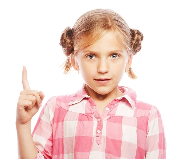 Menina da escola bonita apontando seu dedo indicador para cima em emoção — Fotografia de Stock