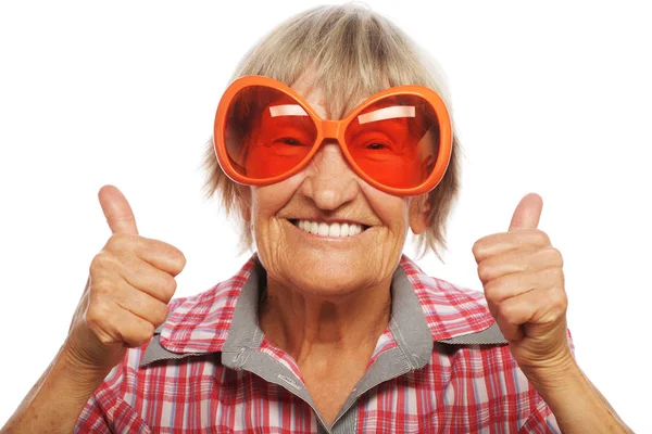 Senior woman wearing big sunglasses — Stock Photo, Image