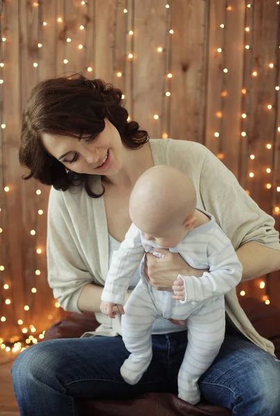 Happy young mother with baby — Stock Photo, Image