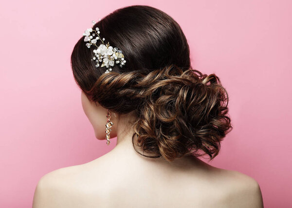   young woman with beautiful hairstyle and stylish hair accessory