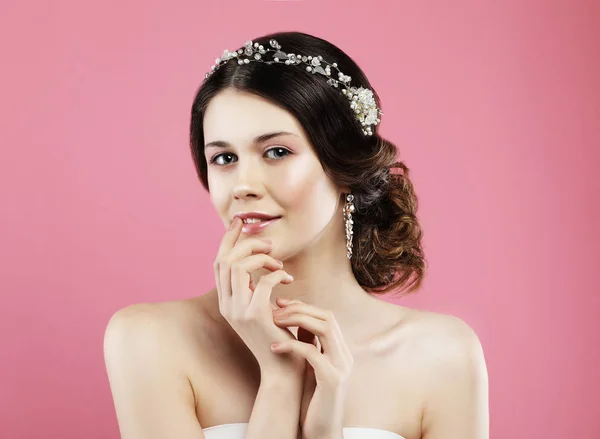 Beautiful model with bridal makeup and hairstyle Stock Image