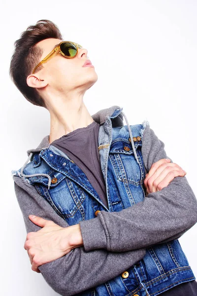 Young man with fashionable sunglasses on white background — Stock Photo, Image