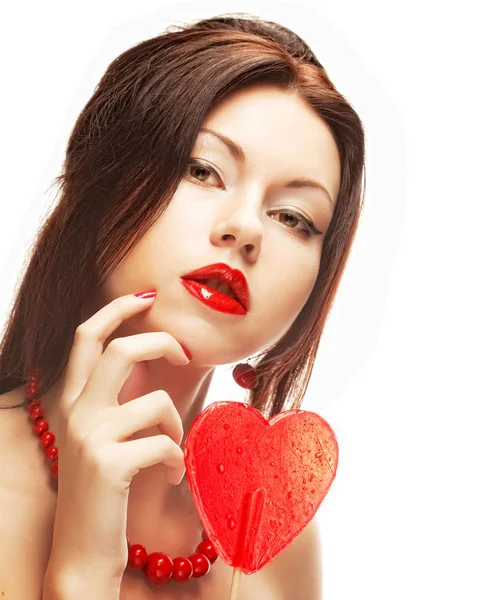 Pretty woman with lollipop. — Stock Photo, Image