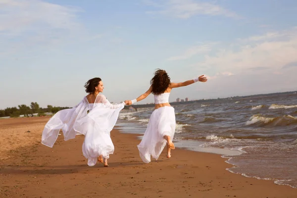 The flying, two young women — Stock Photo, Image