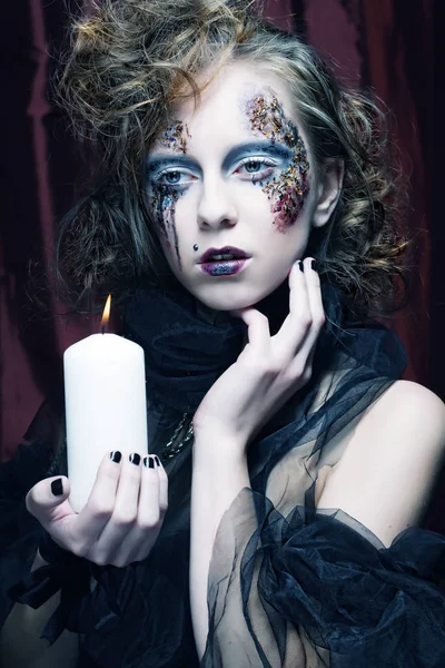 Gothic portrait of woman with candle. — Stock Photo, Image