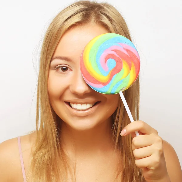 Bella ragazza bionda con lolipop — Foto Stock