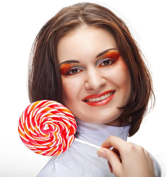 Mujer bastante joven sosteniendo lolly pop . — Foto de Stock