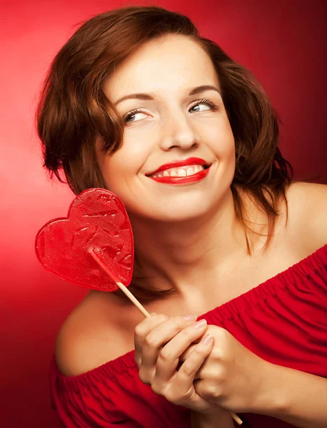 Glückliche Frau mit Herzbonbons Lolly Pop — Stockfoto