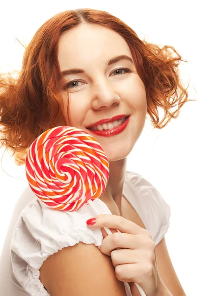 Pretty woman with lollipop. — Stock Photo, Image