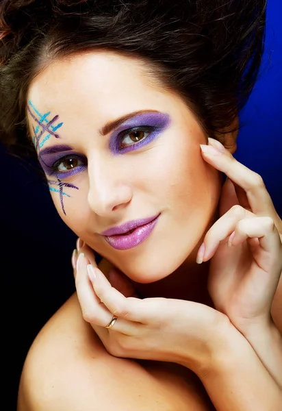 Young female face with bright fashion multicolored make-up — Stock Photo, Image
