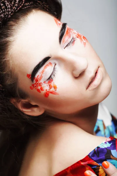 Young female face with bright fashion multicolored make-up — Stock Photo, Image
