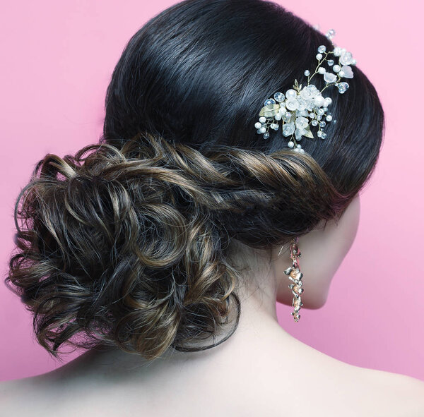   young woman with beautiful hairstyle and stylish hair accessory