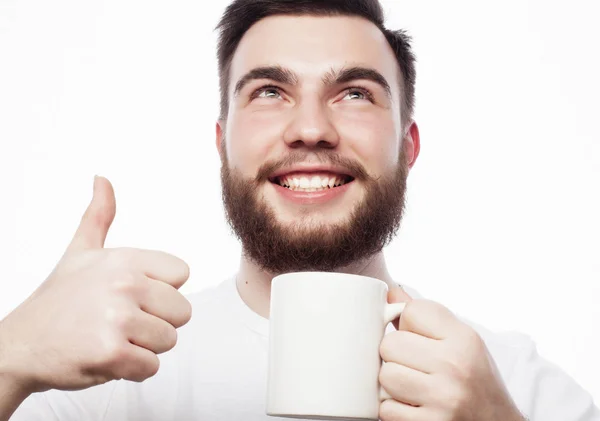 Buenos días, hombre sosteniendo una taza de té. Concepto matutino . —  Fotos de Stock