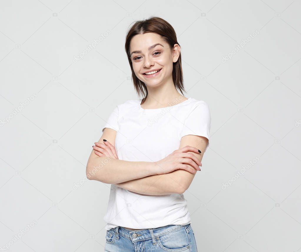Portrait of young positive female with cheerful expression