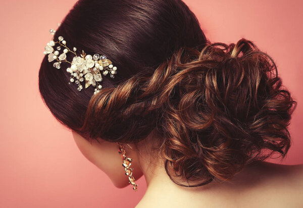   young woman with beautiful hairstyle and stylish hair accessory