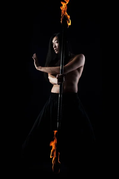 Asian man with fire show — Stock Photo, Image