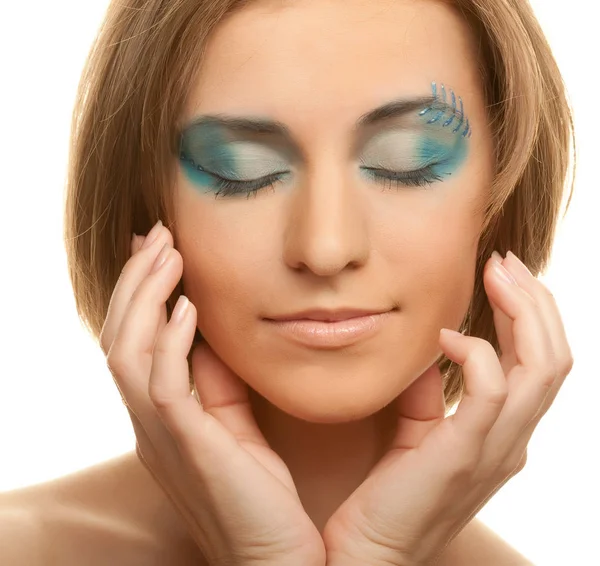 Yaratıcı makyaj. genç kadın üzerinde beyaz izole