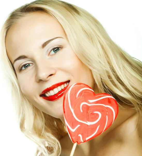 Woman with heart lolly pop — Stock Photo, Image