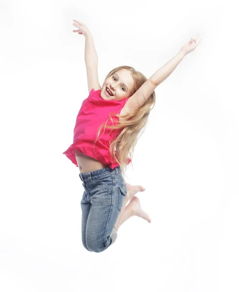 Menina salta em um fundo branco — Fotografia de Stock