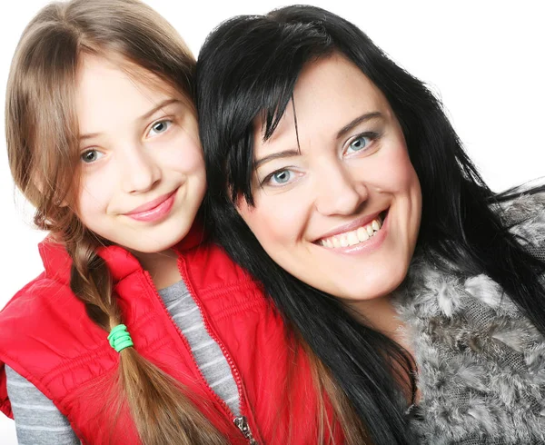 Mother and her daughter smiling at the camera — Stock Photo, Image