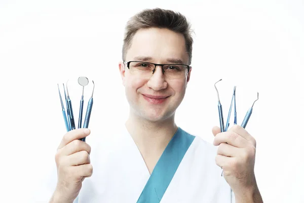 Hermoso joven dentista alegre —  Fotos de Stock