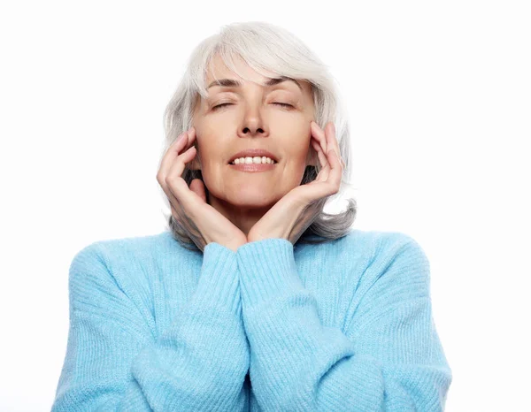 Close up portrait of happy senior woman smiling — Stock Photo, Image