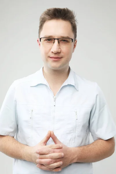 Handsome cheerful young dentist — Stock Photo, Image