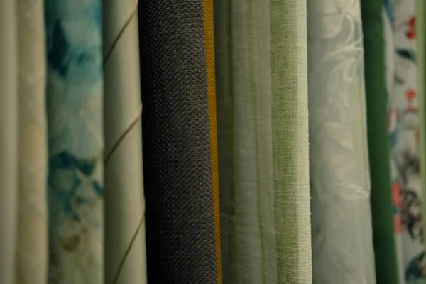 Rolos de tecido e têxteis guardados — Fotografia de Stock