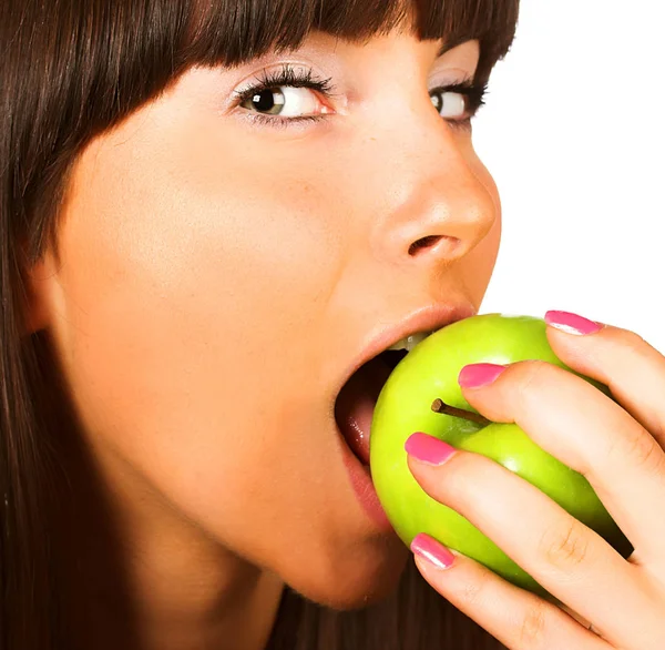 Young girl eating apple — Stock Photo, Image