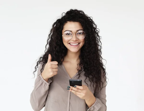 Lifestyle, technology and people concept - Beautiful afro american woman using mobile phone, close up — Stock Photo, Image