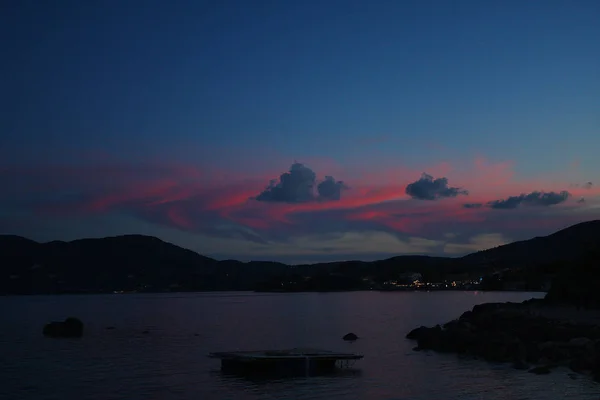 Evening time, sea, sunset. Clouds and calm. Greece, summer.