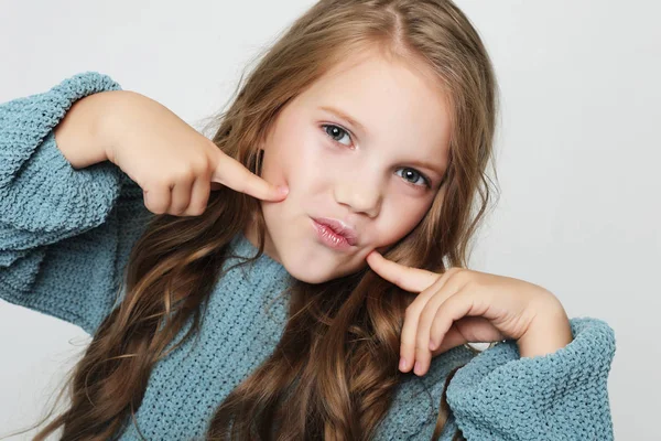 Charming happy young girl. Portrait of pleased carefree adorable daughter with blond hair wearing casual — Stock Photo, Image